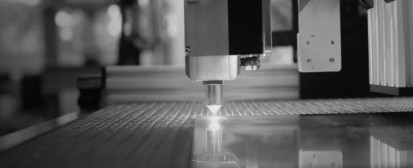 Close up of a laser engraving machine.